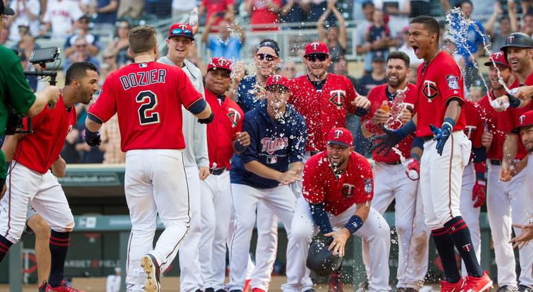 Dozier sends Twins into break on a high note Twins win on walk-off grand slam by Dozier