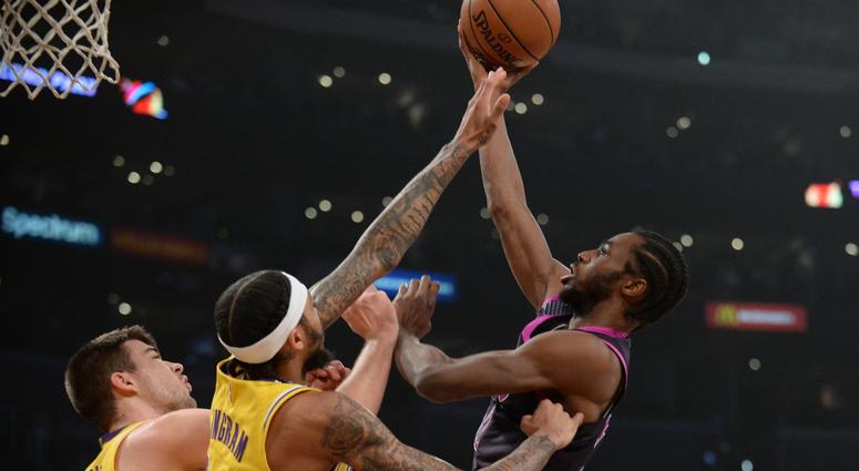 Timberwolves forward Andrew Wiggins drives to the hoop Andrew Wiggins takes it to the rack