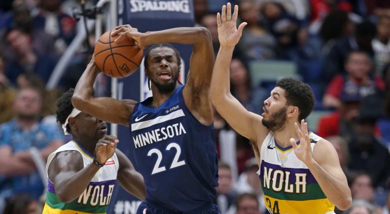 Defenders crowd Andrew Wiggins Andrew Wiggins in the post