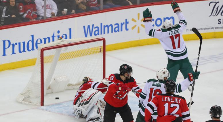 He shoots, he scores and Marcus Foligno and Luke Kunin celebrate for the Wild Goal by the Wild celebrated by Marcus Foligno and Luke Kunin