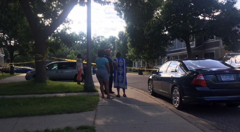 Family members gather at the scene of the suspicious death Family members gather at the scene of the suspicious death