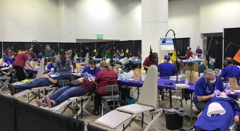 Free dental care at the Minneapolis Convention Center Dentists providing free care