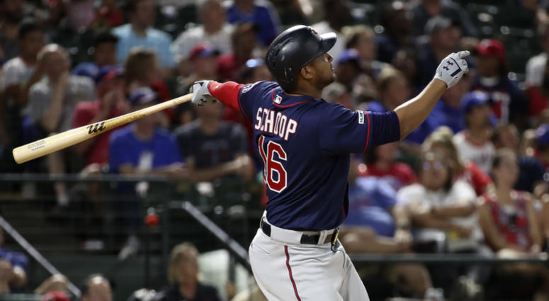 Aug 16, 2019; Arlington, TX, USA; Minnesota Twins second baseman Jonathan Schoop (16) hits a two run home run during the seventh inning against the Texas Rangers at Globe Life Park in Arlington.