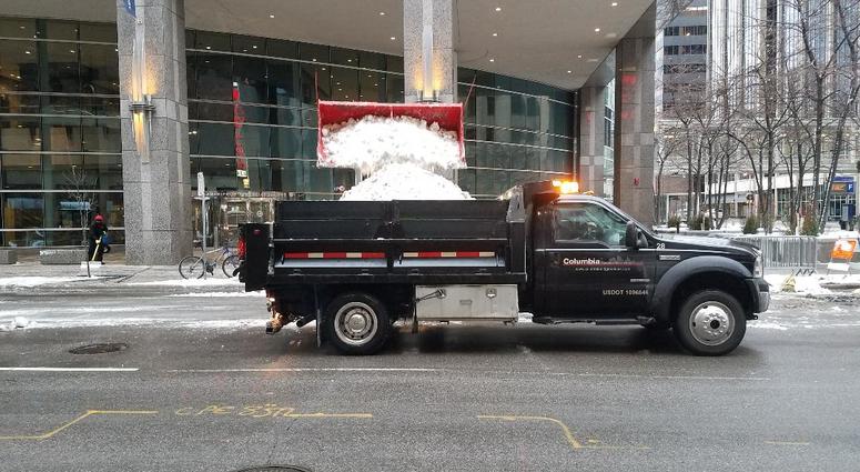 Crews removing snow in Minneapolis Snow cleanup Minneapolis