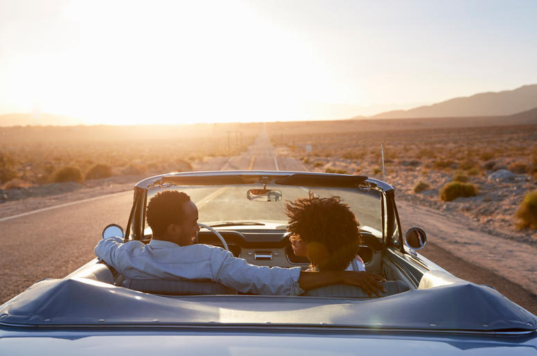 Rear View Of Couple On Road Trip Rear View Of Couple On Road Trip