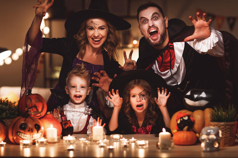 happy family mother father and children in costumes and makeup on Halloween happy family mother father and children in costumes and makeup on Halloween