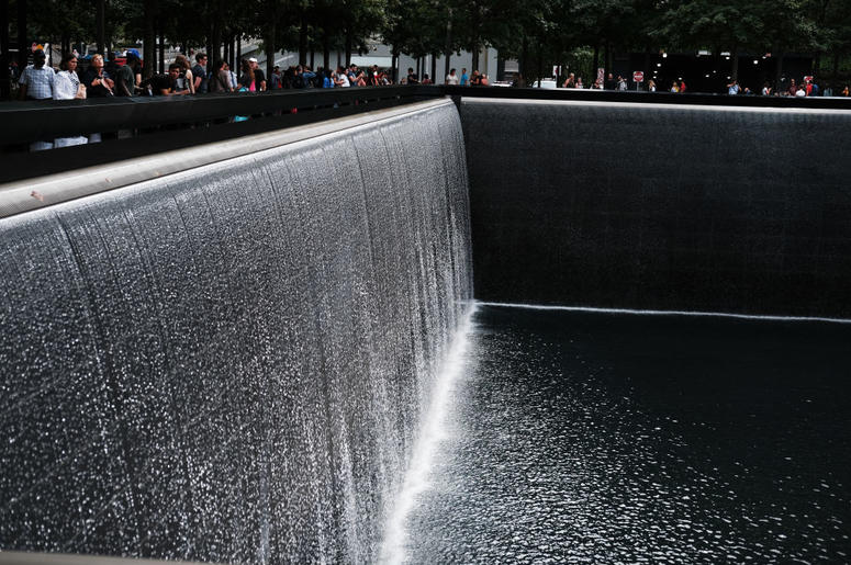 People walk on the grounds of the September 11 Memorial and Museum on September 05, 2019 in New York City. New York City is preparing to commemorate the 18th anniversary of the attacks on the World Trade Center in which 2,996 people were killed and over 6 People walk on the grounds of the September 11 Memorial and Museum on September 05, 2019 in New York City. New York City is preparing to commemorate the 18th anniversary of the attacks on the World Trade Center in which 2,996 people were killed and over 6