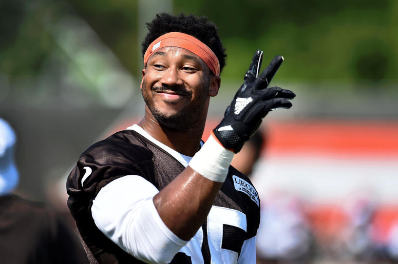 Cleveland Browns defensive end Myles Garrett (95) waves the crowd during training camp at the Cleveland Browns Training Complex. Cleveland Browns defensive end Myles Garrett (95) waves the crowd during training camp at the Cleveland Browns Training Complex.