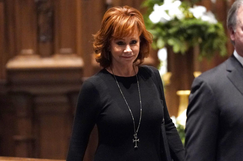Reba McEntire arrives for a funeral service for former President George H.W. Bush at St. Martin's Episcopal Church Thursday, Dec. 6, 2018, in Houston. ( DO NOT USE