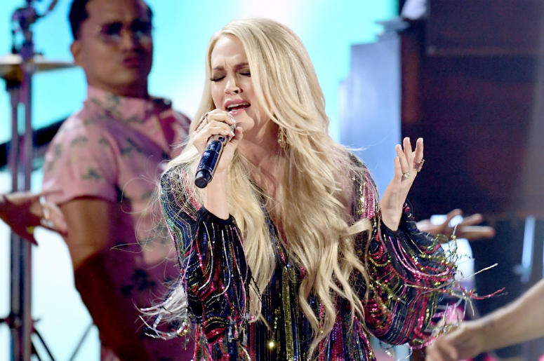 Carrie Underwood performs onstage during the 54th Academy Of Country Music Awards Carrie Underwood performs onstage during the 54th Academy Of Country Music Awards