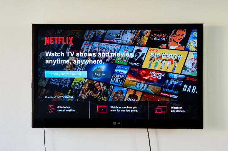 Netflix sign-in page on an LG TV. MONTREAL, CANADA - NOVEMBER 15, 2017: Netflix Sign In and free trial page on LG TV. Netflix is an American entertainment company founded by Reed Hastings and Marc Randolph on August 1997, in CA USA
