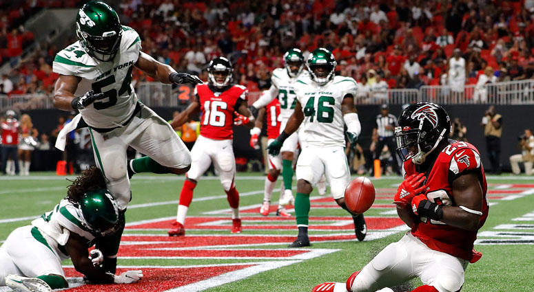Brian Hill of the Atlanta Falcons fails to pull in this reception for a TD against Tevaughn Campbell and Avery Williamsonof the Jets on Aug. 15, 2019 in Atlanta. Brian Hill of the Atlanta Falcons fails to pull in this reception for a TD against Tevaughn Campbell and Avery Williamsonof the Jets on Aug. 15, 2019 in Atlanta.