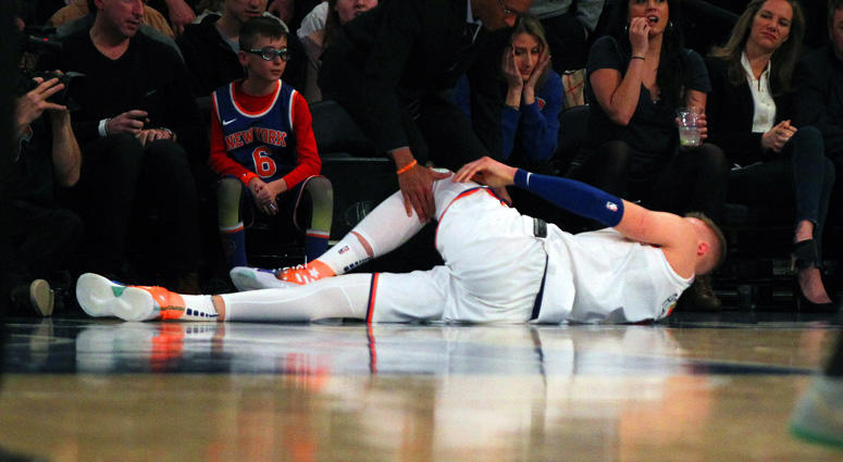 Kristaps Porzingis (6) lays on the court after being injured against the Milwaukee Bucks on Feb. 6, 2018. Kristaps Porzingis (6) lays on the court after being injured against the Milwaukee Bucks on Feb. 6, 2018.