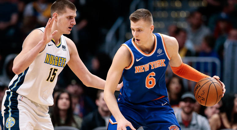 The Knicks' Kristaps Porzingis dribbles against the Nuggets' Nikola Jokic on Jan. 25, 2018 at the the Pepsi Center in Denver. The Knicks' Kristaps Porzingis dribbles against the Nuggets' Nikola Jokic on Jan. 25, 2018 at the the Pepsi Center in Denver.