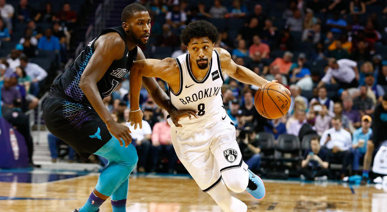 The Nets' Spencer Dinwiddie drives the ball against the Hornets' Michael Kidd-Gilchrist on Feb. 22, 2018, at the Spectrum Center in Charlotte, North Carolina. The Nets' Spencer Dinwiddie drives the ball against the Hornets' Michael Kidd-Gilchrist on Feb. 22, 2018, at the Spectrum Center in Charlotte, North Carolina.