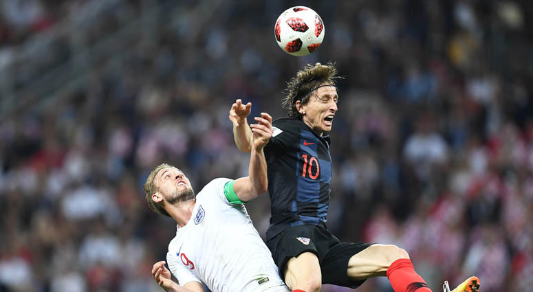 Croatia midfielder Luka Modric (10) plays for the ball against England forward Harry Kane in the semifinals of the FIFA World Cup 2018 on July 11, 2018, at Saint Petersburg Stadium in Moscow. Croatia midfielder Luka Modric (10) plays for the ball against England forward Harry Kane in the semifinals of the FIFA World Cup 2018 on July 11, 2018, at Saint Petersburg Stadium in Moscow.