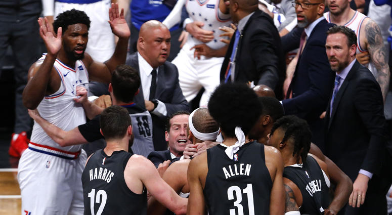 Nets coach Kenny Atkinson stops forward Jared Dudley from going after 76ers center Joel Embiid during the second half of a playoff game on April 20, 2019, at Barclays Center. Nets coach Kenny Atkinson stops forward Jared Dudley from going after 76ers center Joel Embiid during the second half of a playoff game on April 20, 2019, at Barclays Center.