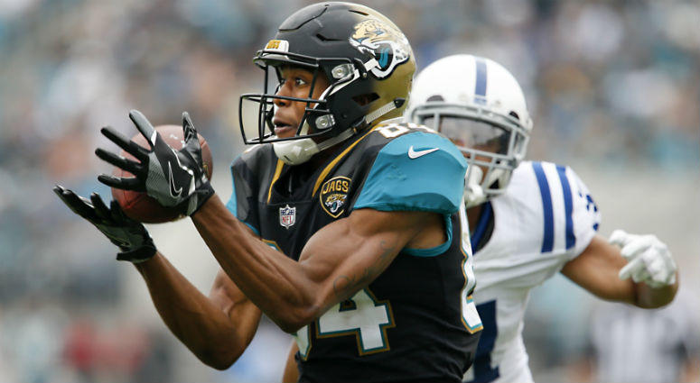 Keelan Cole catches the ball in front of Quincy Wilson during the second half at EverBank Field. Keelan Cole catches the ball in front of Quincy Wilson during the second half at EverBank Field.