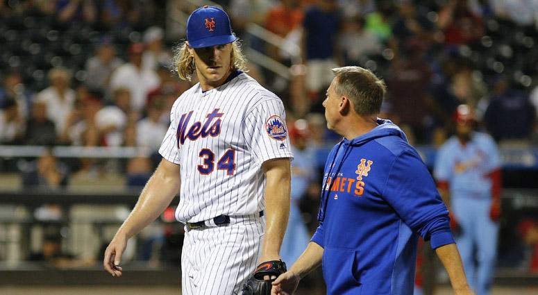 Mets pitcher Noah Syndergaard leaves the field with trainer Brian Chicklo with a leg injury against the St. Louis Cardinals during the seventh inning at Citi Field on June 15, 2019. Mets pitcher Noah Syndergaard leaves the field with trainer Brian Chicklo with a leg injury against the St. Louis Cardinals during the seventh inning at Citi Field on June 15, 2019.