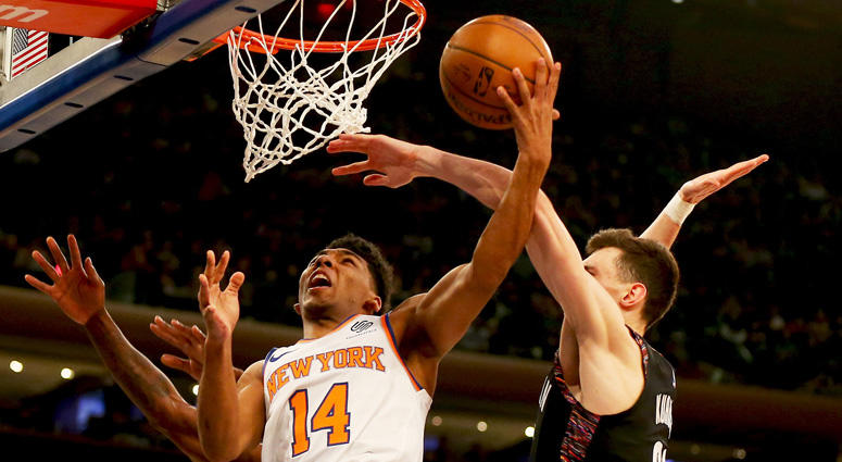 Knicks guard Allonzo Trier goes up for a shot and is fouled by Nets forward Rodions Kurucs on Dec. 8, 2018, at Madison Square Garden. Knicks guard Allonzo Trier goes up for a shot and is fouled by Nets forward Rodions Kurucs on Dec. 8, 2018, at Madison Square Garden.