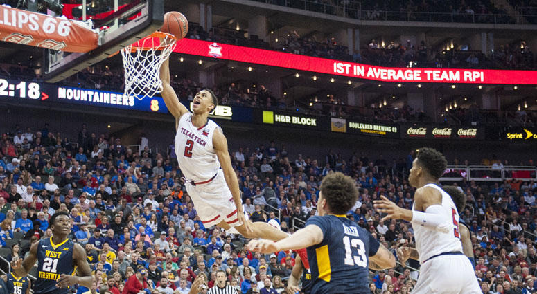 Texas Tech's Zhaire Smith shoots over West Virginia's James Bolden at the Big 12 Tournament semifinals March 9, 2018, in Kansas City, Missouri. Texas Tech's Zhaire Smith shoots over West Virginia's James Bolden at the Big 12 Tournament semifinals March 9, 2018, in Kansas City, Missouri.