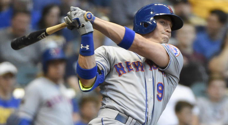 The Mets' Brandon Nimmo hits a triple against the Milwaukee Brewers on April 24, 2018, at Miller Park. The Mets' Brandon Nimmo hits a triple against the Milwaukee Brewers on April 24, 2018, at Miller Park.