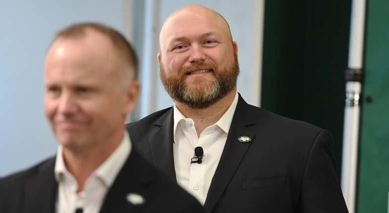 Jets general Joe Douglas walks behind team chairman and CEO Christopher Johnson. Jets general Joe Douglas walks behind team chairman and CEO Christopher Johnson.