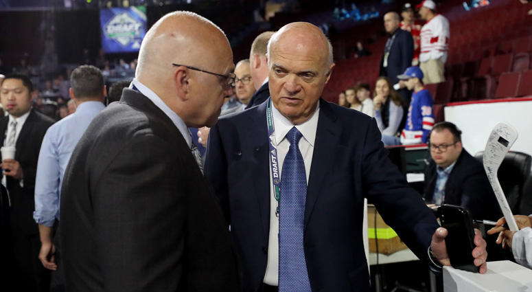 Islanders president Lou Lamoriello chats with coach Barry Trotz during the NHL draft on June 22, 2019, in Vancouver, British Columbia. Islanders president Lou Lamoriello chats with coach Barry Trotz during the NHL draft on June 22, 2019, in Vancouver, British Columbia.