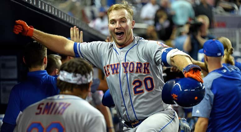 Mets first baseman Pete Alonso celebrates in the dugout after hitting a three-run homer against the Marlins on April 1, 2019, at Marlins Park in Miami. Mets first baseman Pete Alonso celebrates in the dugout after hitting a three-run homer against the Marlins on April 1, 2019, at Marlins Park in Miami.