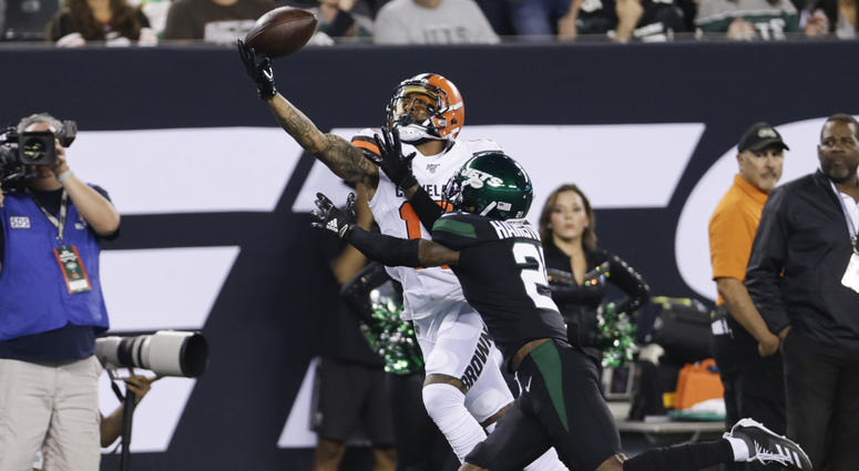 Cleveland Browns' Odell Beckham (13) catches a pass in front of New York Jets' Nate Hairston (21) during the first half of an NFL football game Monday, Sept. 16, 2019, in East Rutherford, N.J Cleveland Browns' Odell Beckham (13) catches a pass in front of New York Jets' Nate Hairston (21) during the first half of an NFL football game Monday, Sept. 16, 2019, in East Rutherford, N.J
