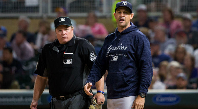 Aaron Boone argues with home plate umpire Marvin Hudson in the sixth inning against Minnesota Twins at Target Field. Aaron Boone argues with home plate umpire Marvin Hudson in the sixth inning against Minnesota Twins at Target Field.