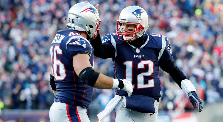 Jan 13, 2019; Foxborough, MA, USA; New England Patriots quarterback Tom Brady (12) and fullback James Develin (46) react after a touchdown during the second quarter in an AFC Divisional playoff game. Mandatory Credit: Winslow Townson-USA TODAY Sports Jan 13, 2019; Foxborough, MA, USA; New England Patriots quarterback Tom Brady (12) and fullback James Develin (46) react after a touchdown during the second quarter in an AFC Divisional playoff game. Mandatory Credit: Winslow Townson-USA TODAY Sports