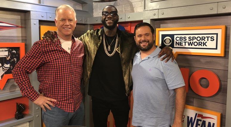 Deontay Wilder poses with WFAN's Boomer and Gio on Oct. 1, 2018. Deontay Wilder poses with WFAN's Boomer and Gio on Oct. 1, 2018.