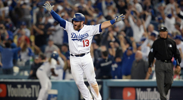 The Dodgers' Max Muncy celebrates after hitting a solo home run against the Boston Red Sox in the 18th inning in Game 3 of the 2018 World Series on Oct. 27, 2018, at Dodger Stadium in Los Angeles. The Dodgers' Max Muncy celebrates after hitting a solo home run against the Boston Red Sox in the 18th inning in Game 3 of the 2018 World Series on Oct. 27, 2018, at Dodger Stadium in Los Angeles.