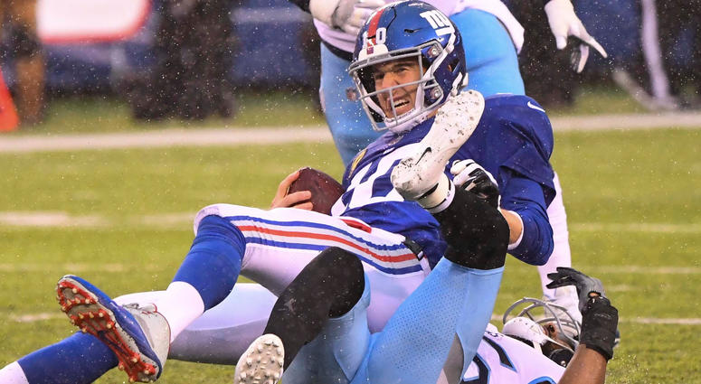 Dec 16, 2018; East Rutherford, NJ, USA; New York Giants quarterback Eli Manning (10) gets sacked by Tennessee Titans cornerback Logan Ryan (26) during the 2nd quarter at MetLife Stadium. Mandatory Credit: Robert Deutsch-USA TODAY Sports Dec 16, 2018; East Rutherford, NJ, USA; New York Giants quarterback Eli Manning (10) gets sacked by Tennessee Titans cornerback Logan Ryan (26) during the 2nd quarter at MetLife Stadium. Mandatory Credit: Robert Deutsch-USA TODAY Sports