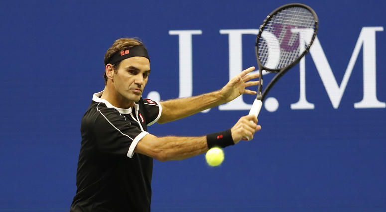 Roger Federer hits a backhand against Grigor Dimitrov in a quarterfinal match at the U.S. Open on Sept. 3, 2019. Roger Federer hits a backhand against Grigor Dimitrov in a quarterfinal match at the U.S. Open on Sept. 3, 2019.