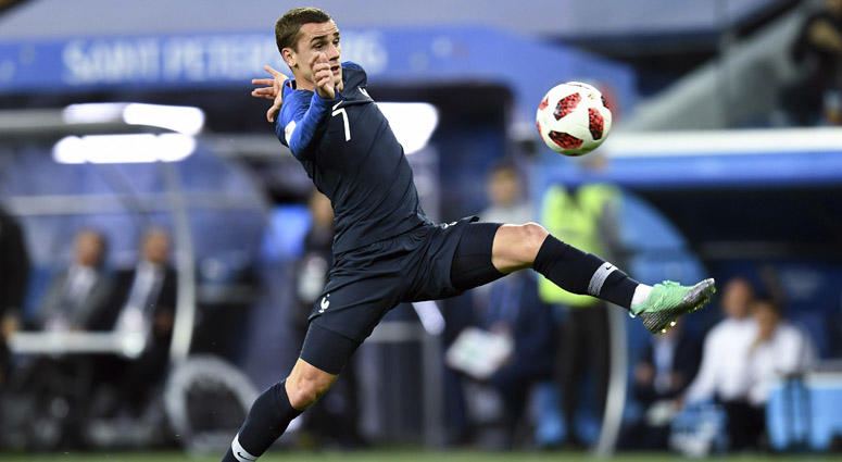 France forward Antoine Griezmann lunges for the ball during the second half in the semifinals of the FIFA World Cup 2018 against Belgium on July 10, 2018, at Saint Petersburg Stadium in Moscow. France forward Antoine Griezmann lunges for the ball during the second half in the semifinals of the FIFA World Cup 2018 against Belgium on July 10, 2018, at Saint Petersburg Stadium in Moscow.