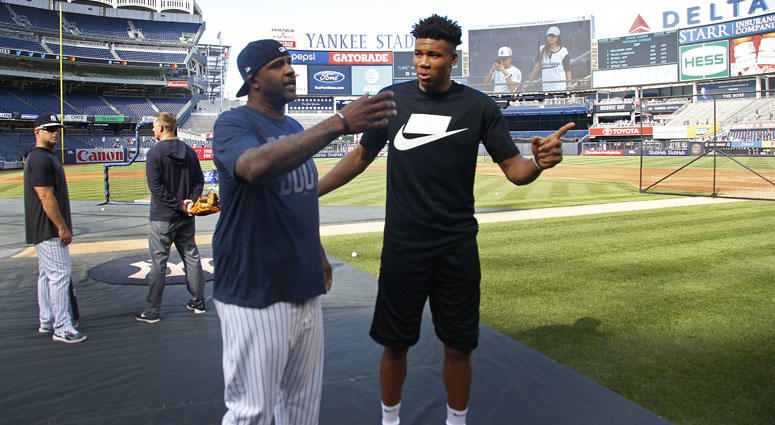 Milwaukee Bucks basketball player Giannis Antetokounmpo and Yankees pitcher CC Sabathia chat before the Yankees' game against the Tampa Bay Rays on July 15, 2019, at Yankee Stadium. Milwaukee Bucks basketball player Giannis Antetokounmpo and Yankees pitcher CC Sabathia chat before the Yankees' game against the Tampa Bay Rays on July 15, 2019, at Yankee Stadium.