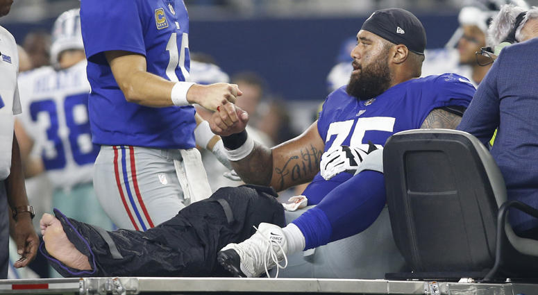 Giants center Jon Halapio is carted off the field after being injured against Dallas Cowboys on Sept. 16, 2018, at AT&T Stadium. Giants center Jon Halapio is carted off the field after being injured against Dallas Cowboys on Sept. 16, 2018, at AT&T Stadium.