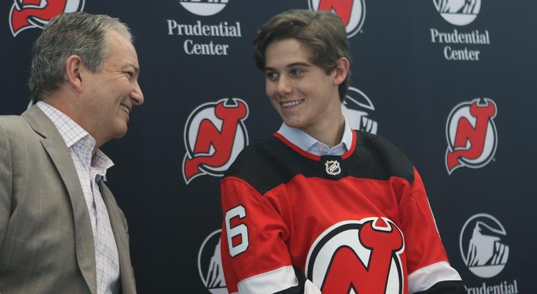Devils Executive Vice President and General Manager, Ray Shero, is shown with number one draft pick, Jack Hughes, during a press conference, Tuesday June 25, 2019 Jack Hughes
