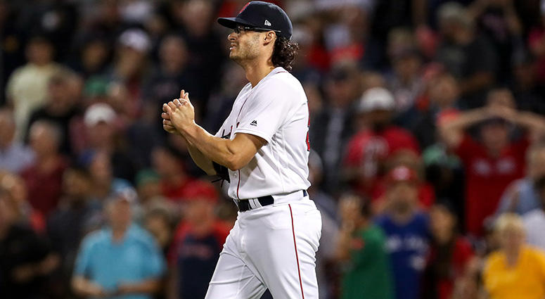 Boston Red Sox relief pitcher Joe Kelly (56) reacts after hitting Toronto Blue Jays centerfielder Kevin Pillar (11) with a pitch that brought in the tying run during the eighth inning at Fenway Park. Boston Red Sox relief pitcher Joe Kelly (56) reacts after hitting Toronto Blue Jays centerfielder Kevin Pillar (11) with a pitch that brought in the tying run during the eighth inning at Fenway Park.