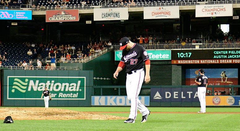 Washington Nationals relief pitcher Shawn Kelley reacts after giving up a two-run home run in the ninth inning against the New York Mets on July 31, 2018, at Nationals Park in Washington, D.C. Washington Nationals relief pitcher Shawn Kelley reacts after giving up a two-run home run in the ninth inning against the New York Mets on July 31, 2018, at Nationals Park in Washington, D.C.