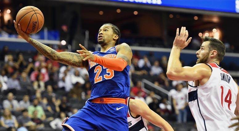 Knicks guard Trey Burke (23) shoots against Wizards forward Jason Smith on Oct. 1, 2018, at Capital One Arena in Washington. Knicks guard Trey Burke (23) shoots against Wizards forward Jason Smith on Oct. 1, 2018, at Capital One Arena in Washington.