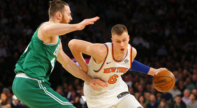 Knicks power forward Kristaps Porzingis drives against Celtics center Aron Baynes on Dec. 22, 2017, at Madison Square Garden. Knicks power forward Kristaps Porzingis drives against Celtics center Aron Baynes on Dec. 22, 2017, at Madison Square Garden.