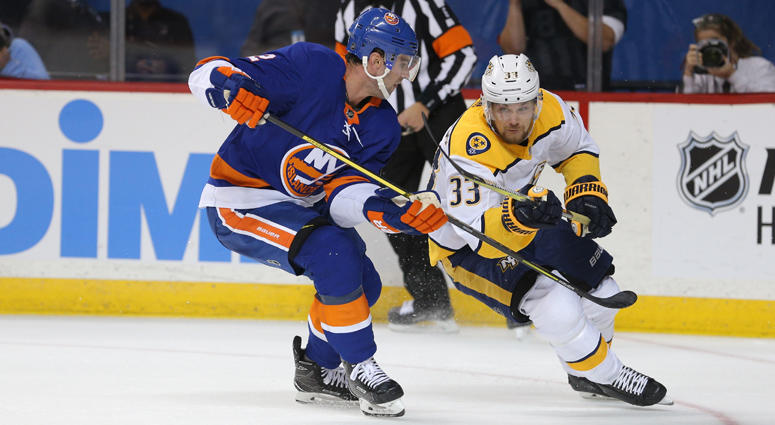 Islanders defenseman Nick Leddy and Predators left wing Viktor Arvidsson fight for the puck on Oct. 6, 2018, at Barclays Center. Islanders defenseman Nick Leddy and Predators left wing Viktor Arvidsson fight for the puck on Oct. 6, 2018, at Barclays Center.