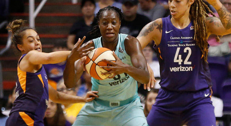 Mercury's Leilani Mitchell (5) and Brittany Griner (42) double-team Liberty's Tina Charles (31) during the first half at Talking Stick Resort Arena in Phoenix, Ariz. on Aug. 19, 2018. Mercury's Leilani Mitchell (5) and Brittany Griner (42) double-team Liberty's Tina Charles (31) during the first half at Talking Stick Resort Arena in Phoenix, Ariz. on Aug. 19, 2018.