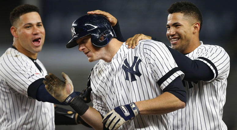 The Yankees' Gary Sanchez (left) and Gleyber Torres (right) celebrate with DJ LeMahieu after his walk-off single against the Seattle Mariners on May 7, 2019, at Yankee Stadium. The Yankees' Gary Sanchez (left) and Gleyber Torres (right) celebrate with DJ LeMahieu after his walk-off single against the Seattle Mariners on May 7, 2019, at Yankee Stadium.