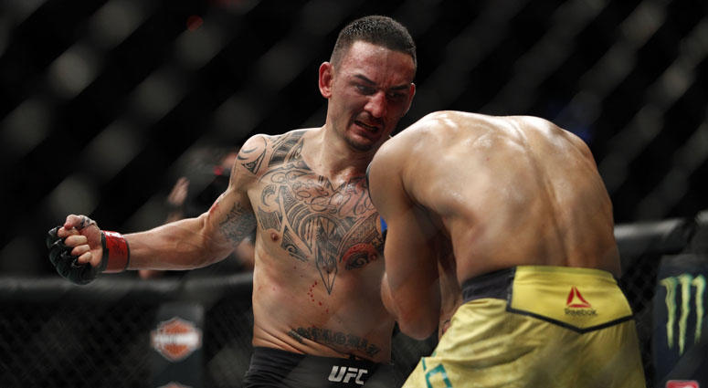 Max Holloway (left) fights Jose Aldo during UFC 218 on Dec. 3, 2017, at Little Caesars Arena in Detroit. Max Holloway (left) fights Jose Aldo during UFC 218 on Dec. 3, 2017, at Little Caesars Arena in Detroit.