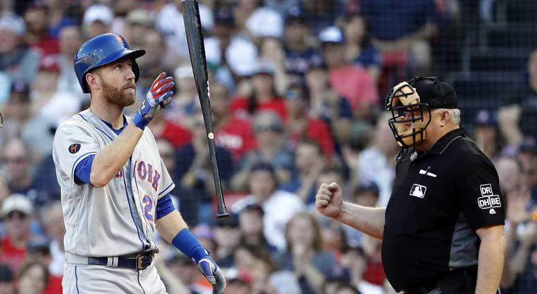 Mets third baseman Todd Frazier tosses his bat after striking out against the Red Sox on Sept. 16, 2018, at Fenway Park in Boston. Mets third baseman Todd Frazier tosses his bat after striking out against the Red Sox on Sept. 16, 2018, at Fenway Park in Boston.