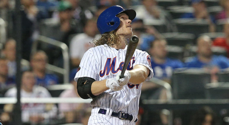 Mets pitcher Noah Syndergaard (34) hits a sacrifice fly against the Toronto Blue Jays on May 15, 2018, at Citi Field. Mets pitcher Noah Syndergaard (34) hits a sacrifice fly against the Toronto Blue Jays on May 15, 2018, at Citi Field.
